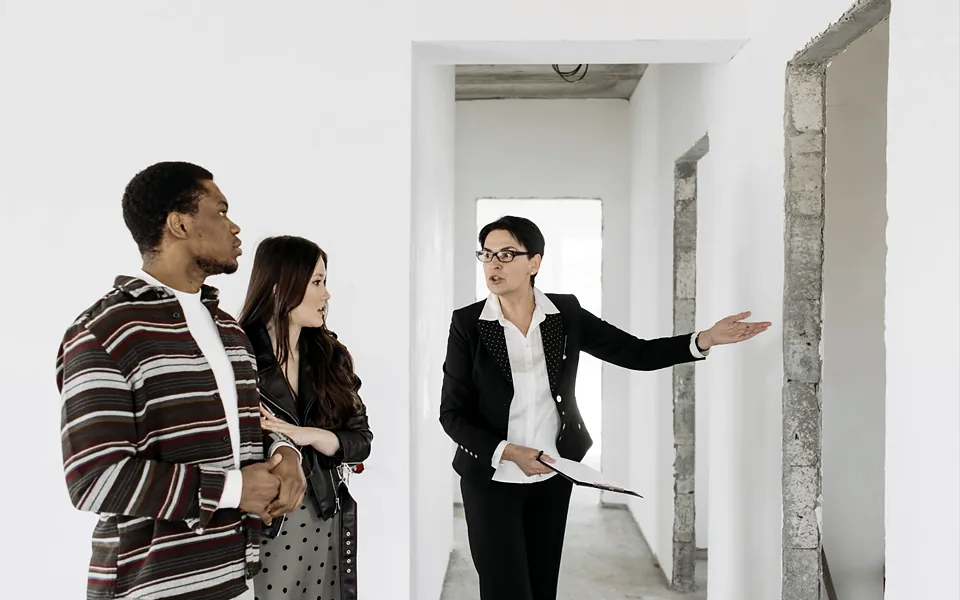 Property manager showing an apartment to prospective tenants